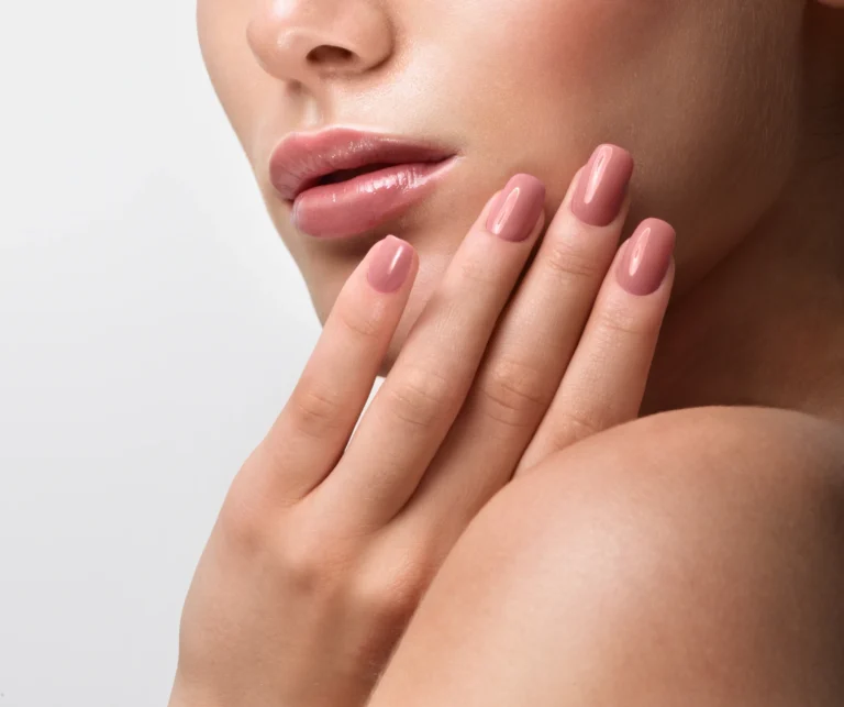 Portrait of young hot female touching her face | Gretchen W Frieling MD