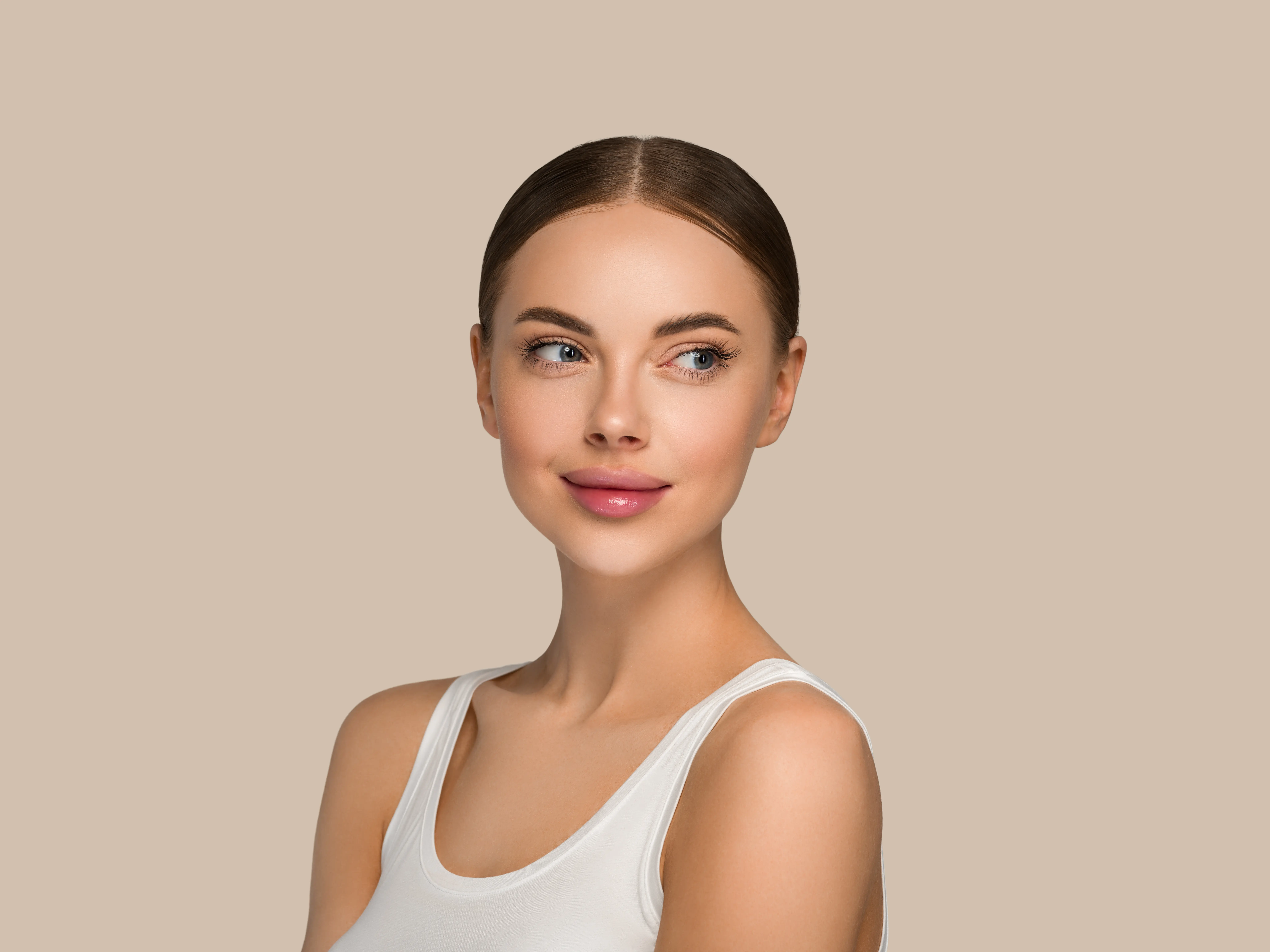 Woman with glowing skin representing PRF and EZ Gel treatments